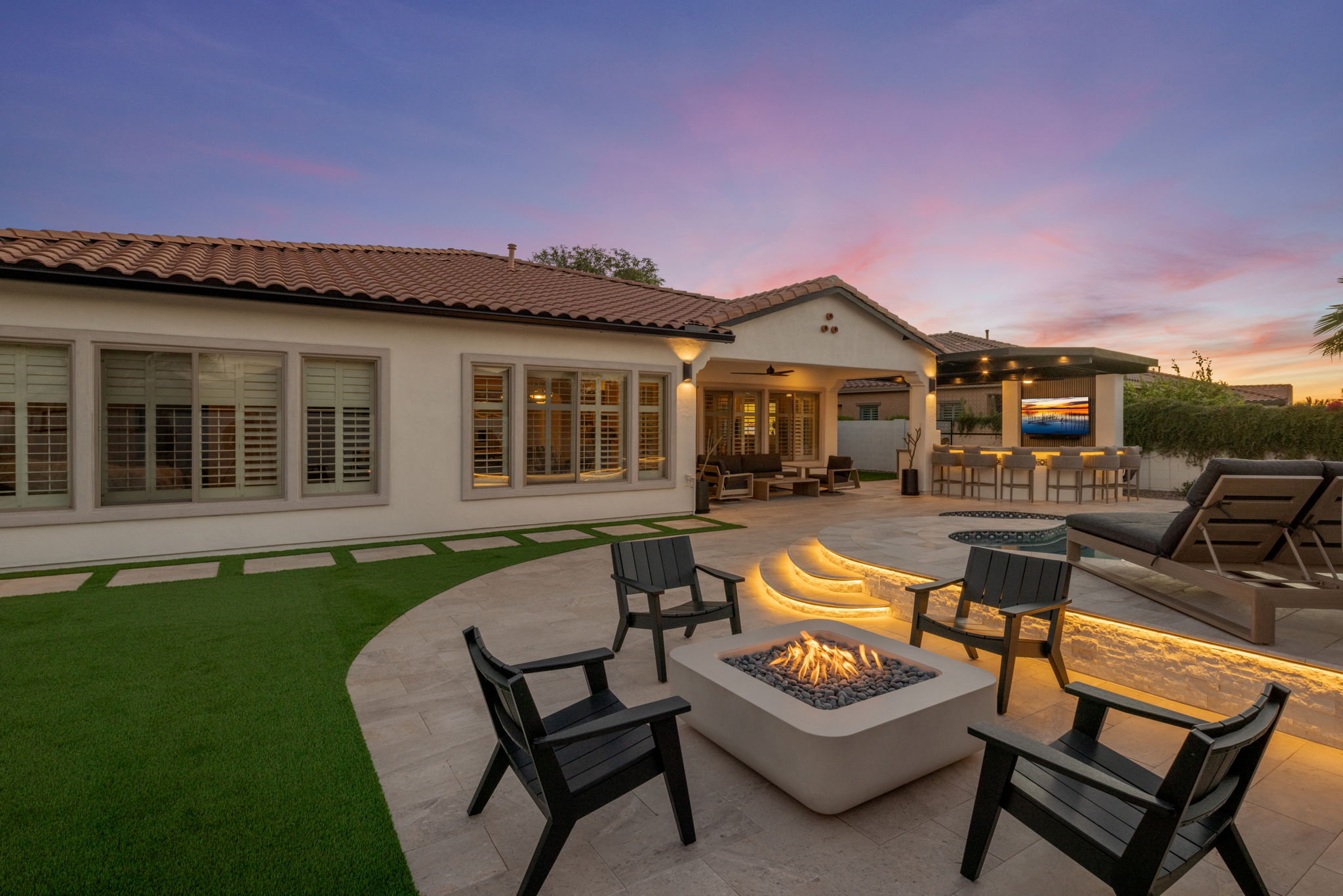 Twilight outdoor living with fire pit